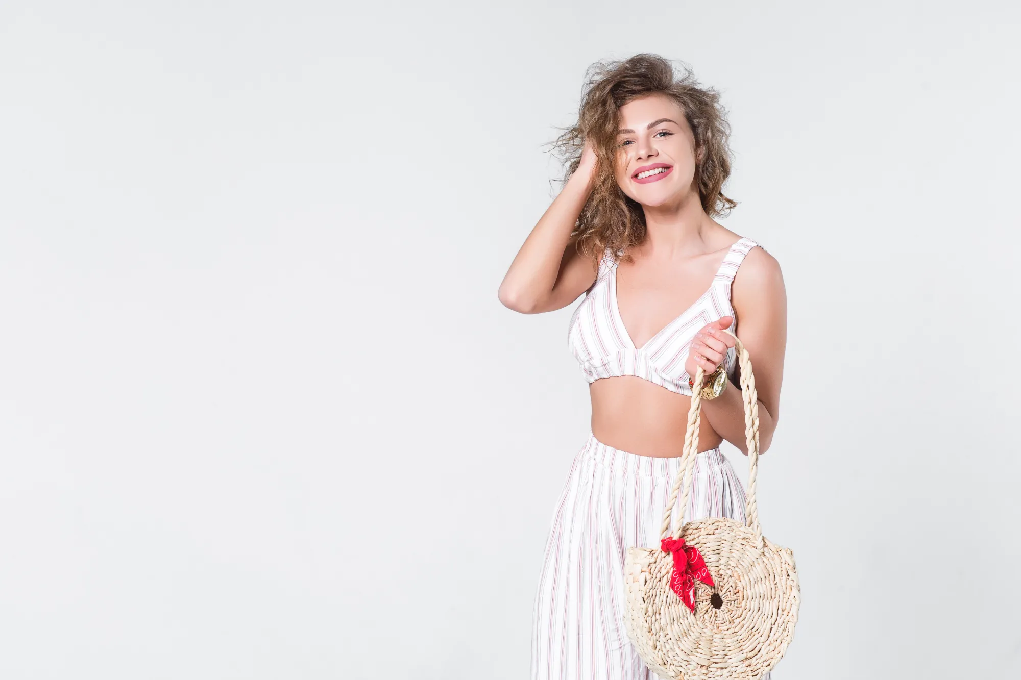 surprised-woman-shopaholic-wpth-candid-emotions-staying-white-background-holding-new-bag